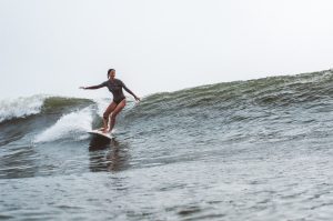 Amy Schwartz riding a wave